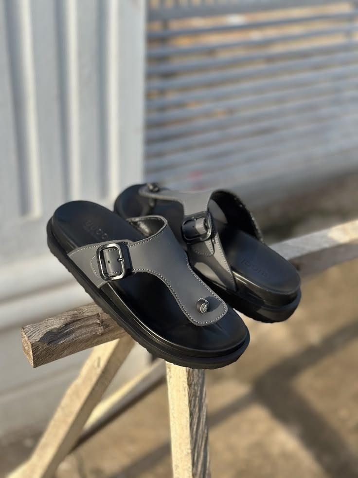 Black two-tone toe-loop sandals