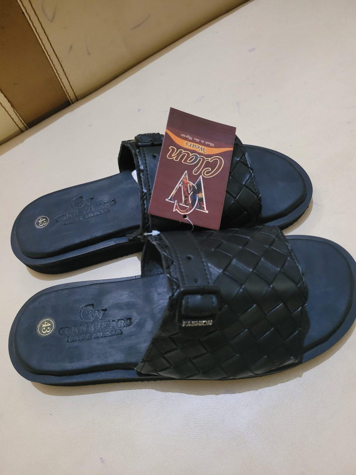 Black woven leather slides