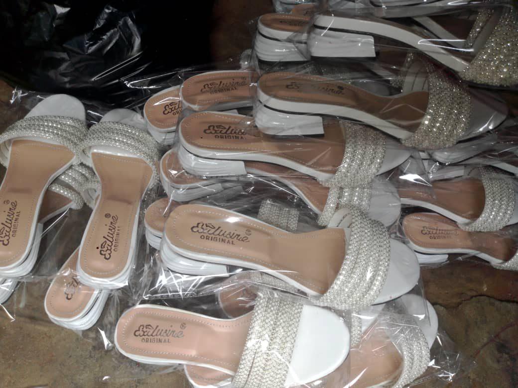 Pearl-band low heels, packed for delivery
