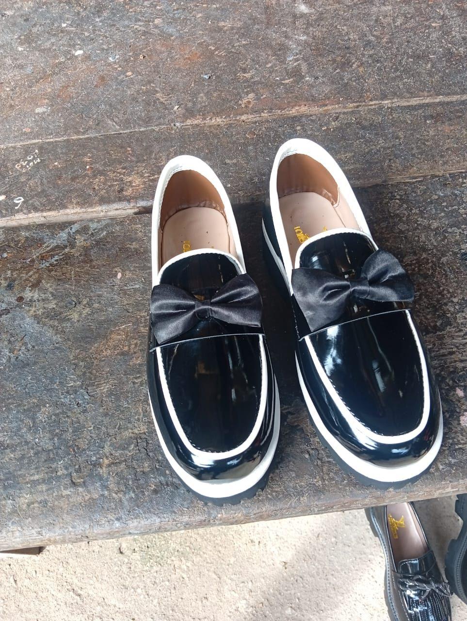 Patent bow loafers, front view
